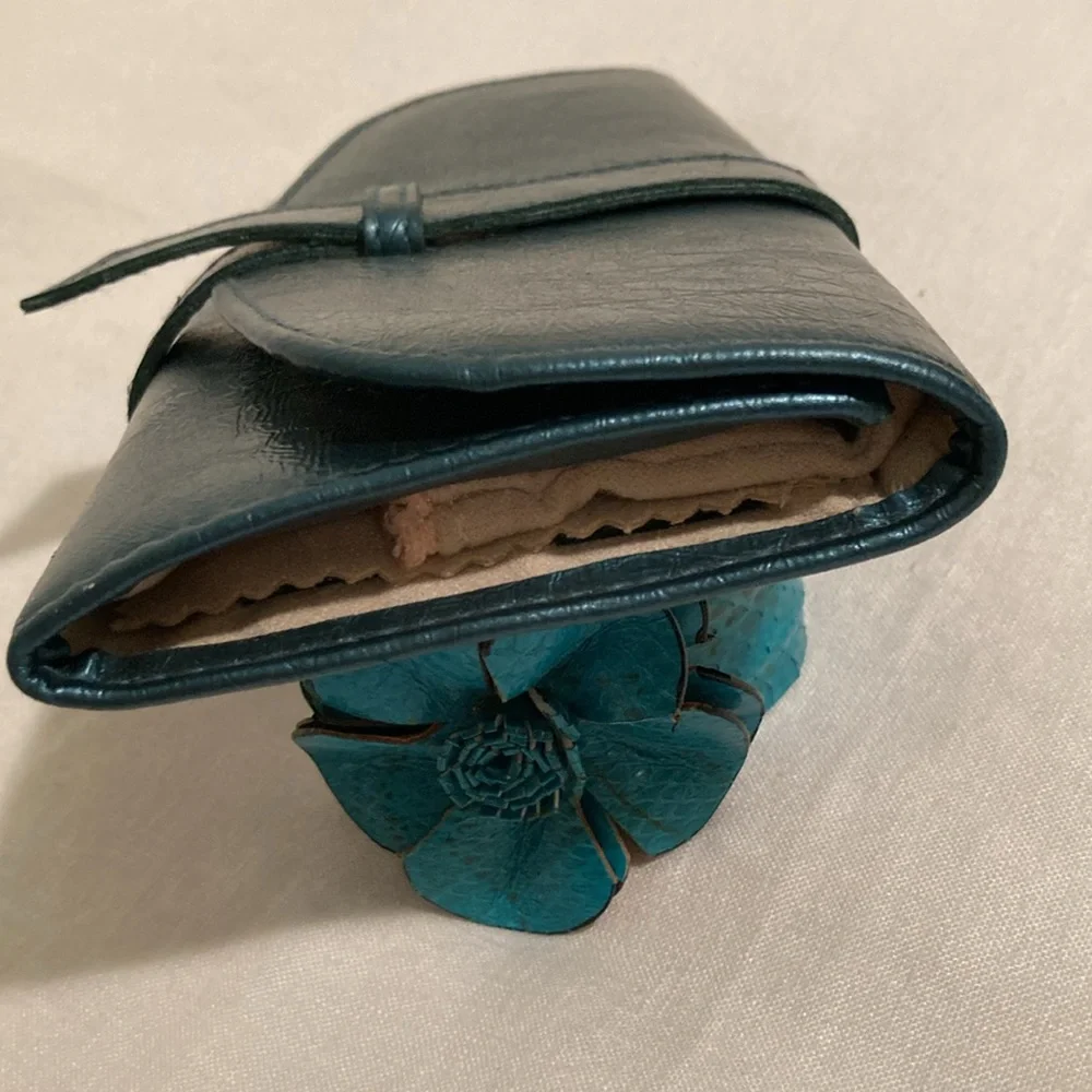Mele & Co jewelry roll travel case teal blue